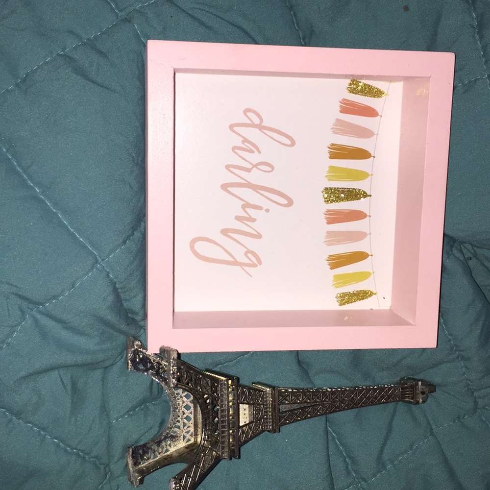 Eiffel Tower. Pink wooden Bored that says darling